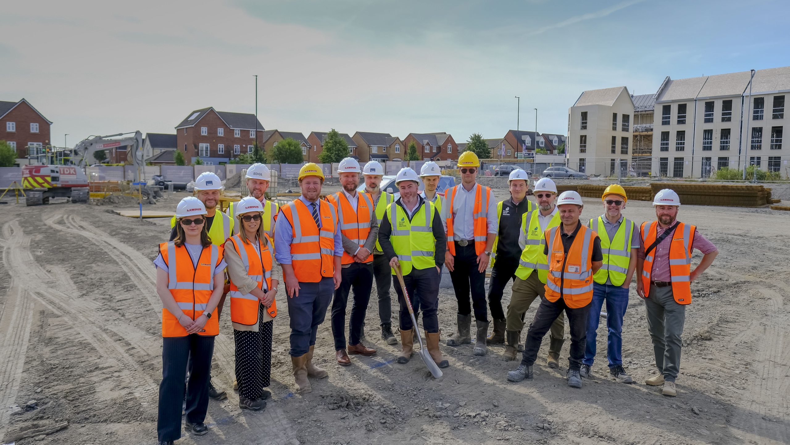 Sod-cutting ceremony marks start of work on new homes at old mine